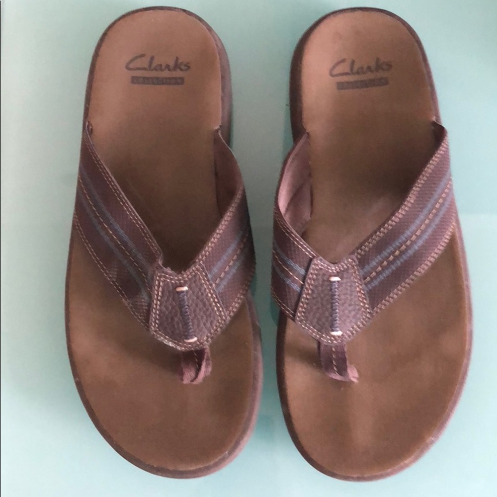 Men’s Clark’s flip flops 9M